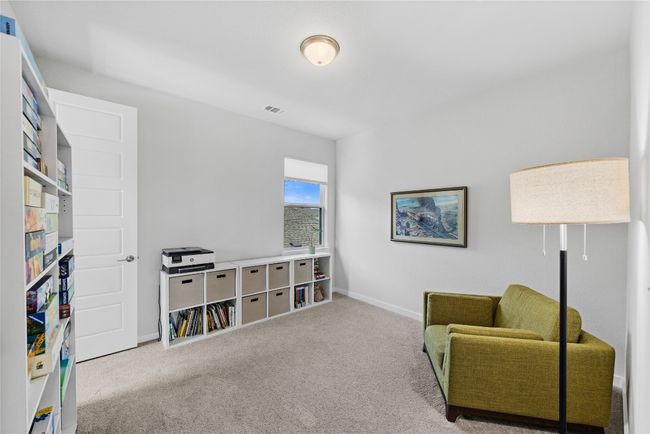 Sitting room with baseboards, visible vents, and carpet | Image 19