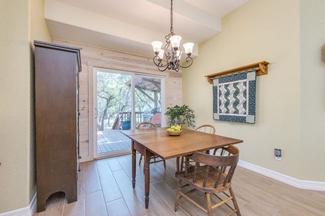 Second dining area with a view to the kitchen and living area | Image 23