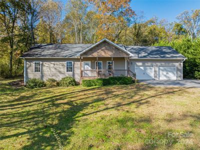 Welcome to 49 Cathey, a well-maintained home on a quiet lot in pastoral Candler. | Image 1