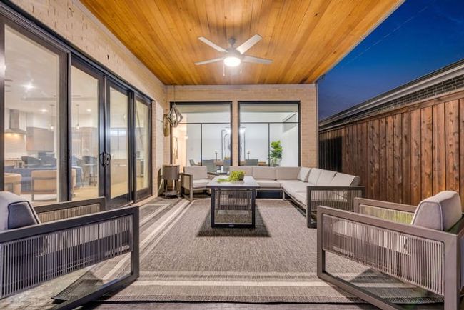 Sunroom / solarium with ceiling fan and wood ceiling | Image 36