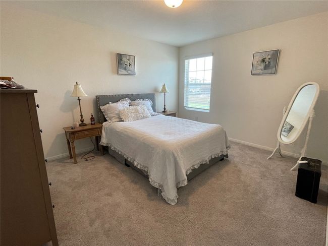 Bath 3 is located upstairs for rooms 3 & 4 to share. | Image 26