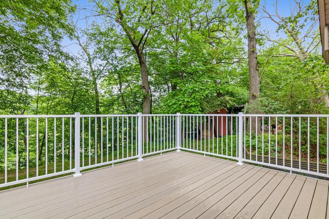 Enjoy peaceful nights on your deck overlooking the pond and trees. | Image 23