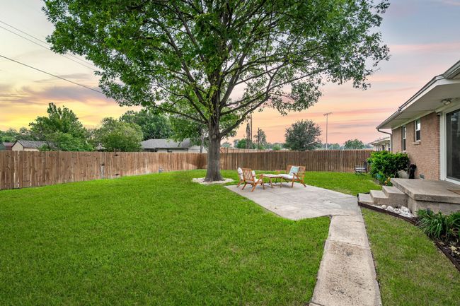 The spacious backyard gives lots of room for play and entertaining. | Image 4