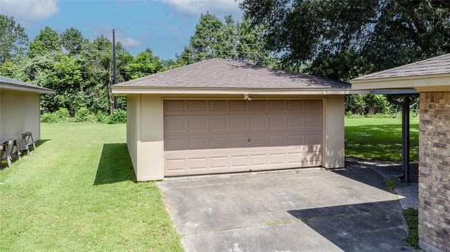 Large garage in the back yard can be used for boat storage | Image 5