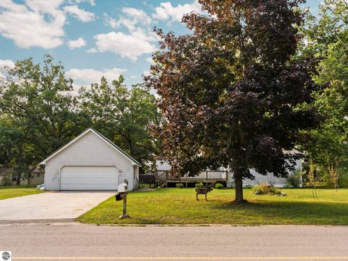 404 Merritt St, Fife Lake, MI, 49633-9388 | Card Image