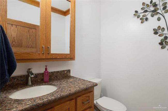 Bathroom with vanity and toilet | Image 12
