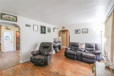 Living room featuring hardwood / wood-style floors | Image 1