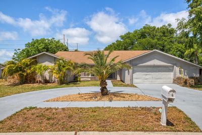 209 Normandy Circle W, House other with 4 bedrooms, 3 bathrooms and null parking in Palm Harbor FL | Image 1