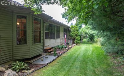 Bordered by mature trees behind the property | Image 3