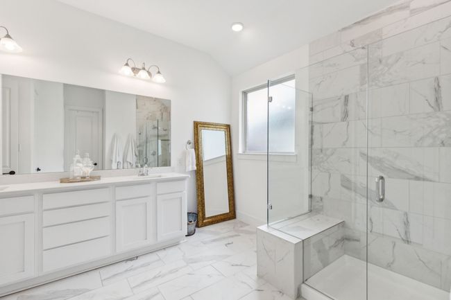Floor to ceiling tile in the upgraded shower | Image 18