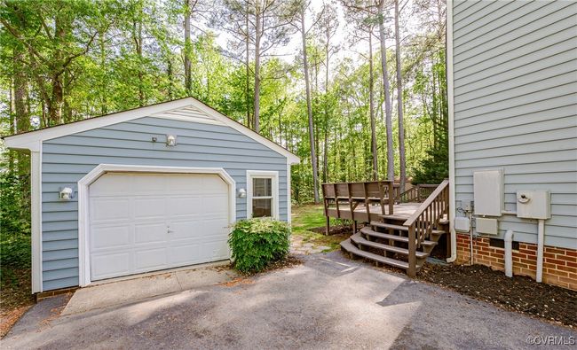 Detached garage with driveway | Image 49