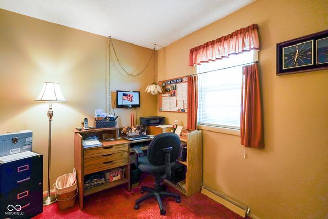 office area with carpet flooring and a baseboard radiator | Image 19