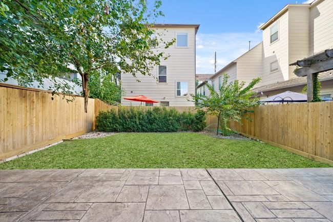 Big patio and real backyard, a rarity for townhomes! | Image 21