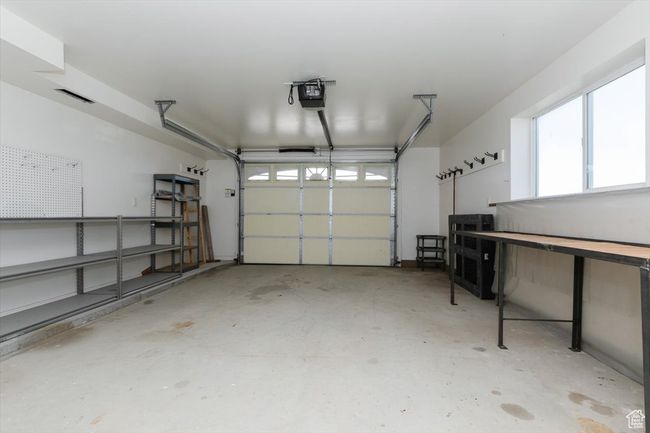 Garage with a garage door opener | Image 47