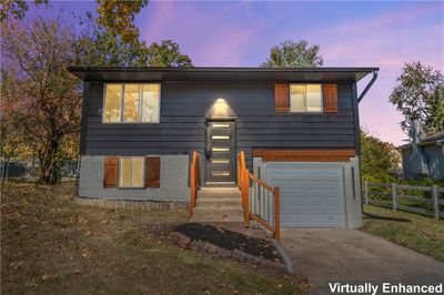 View of front of home featuring a garage | Image 1