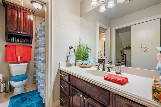 Full bathroom featuring vanity and tile patterned flooring | Image 33