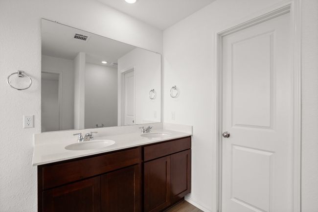 Full bathroom featuring double vanity and recessed lighting | Image 17