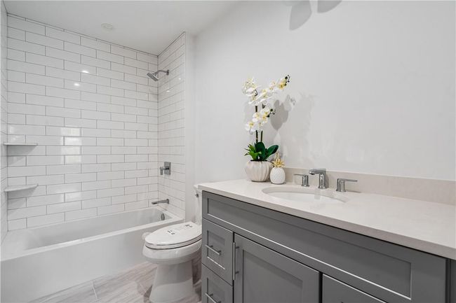Unit #1: Left side, full bathroom on the 2nd level. | Image 15