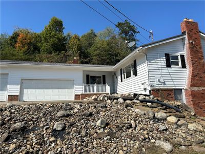 View of front of property with a garage | Image 1