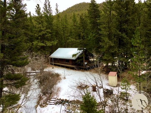 3925 Little Wolf Creek Rd, Wolf Creek, MT, 59648-8530 | Card Image