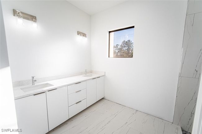 Bathroom featuring vanity | Image 11