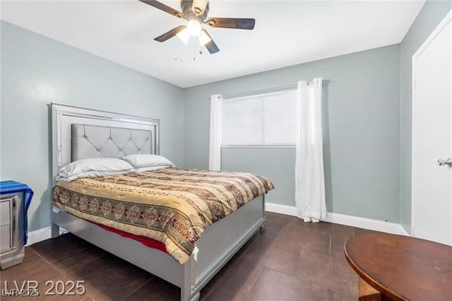 Bedroom with baseboards and a ceiling fan | Image 22