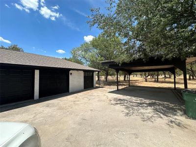 Ranch-style home with a front lawn | Image 2