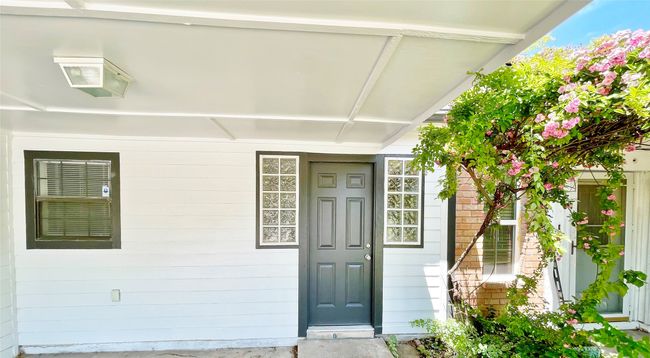 Doorway to property with covered porch | Image 25
