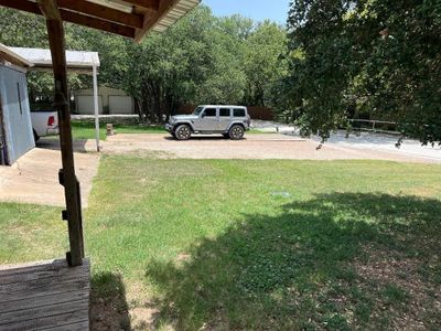 View of yard featuring an outbuilding | Image 3