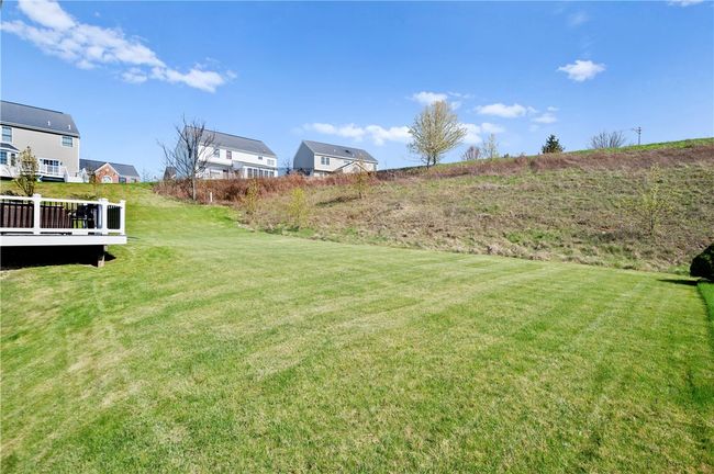 The yard offers plenty of space to play. | Image 28