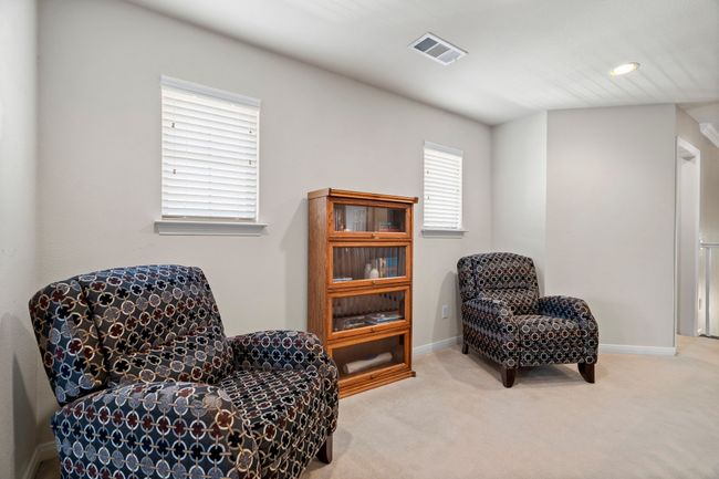 Upstairs sitting area between the media and game room | Image 23