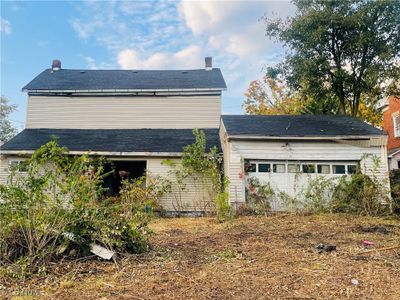 Rear view of house with a garage | Image 3