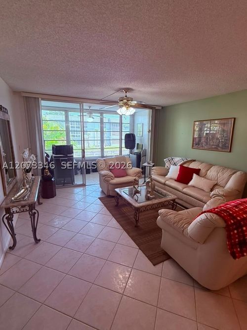 n208-8330 Sands Point Blvd, Tamarac, FL, 33321-3825 | Card Image