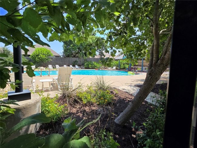 Community pool featuring a patio | Image 40