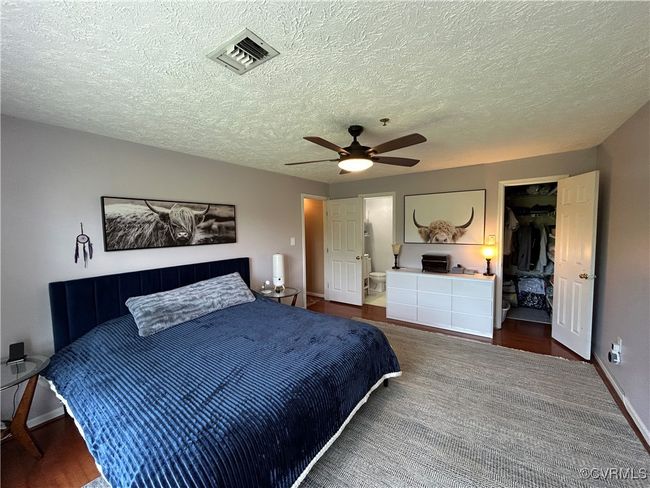 Primary bedroom with walk in closet and full bath (shower) | Image 15