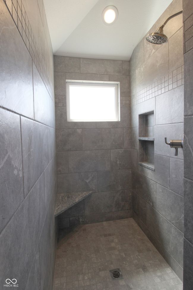 full bath with tiled shower | Image 12