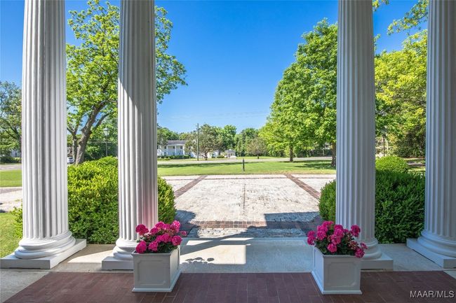 Solid mahogany columns frame the front porch | Image 4