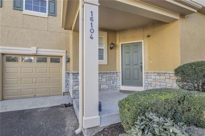 Property entrance with a garage | Image 2