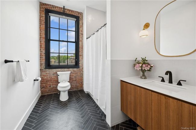 Radiant heat flooring in both bathrooms. | Image 13