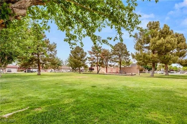 View of property's community with a yard | Image 54