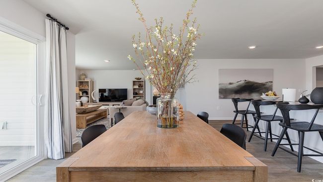 Dining area featuring recessed lighting, baseboards, and wood finished floors | Image 9