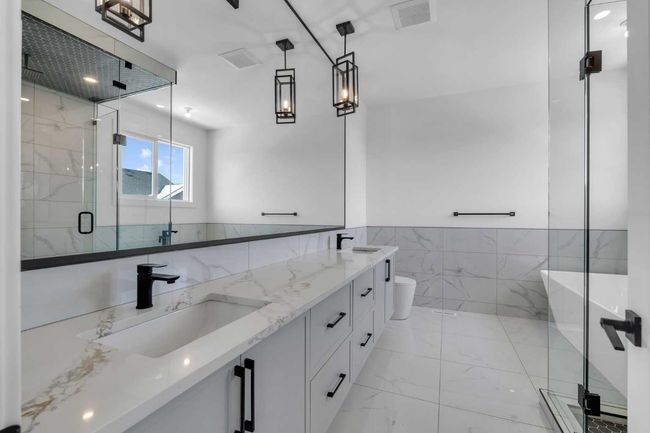223 Kinniburgh Loop, House other with 4 bedrooms, 4 bathrooms and 5 parking in Chestermere AB | Image 44