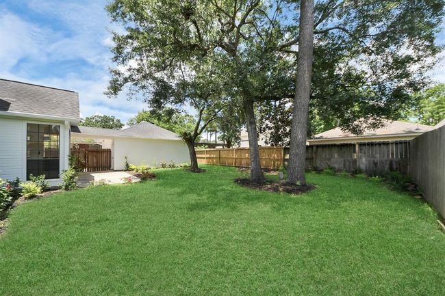 Great size fully fenced backyard with tree shade/coverage. | Image 48