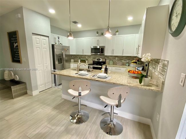 10607 W 34 Th Ct, Townhouse with 3 bedrooms, 3 bathrooms and null parking in Hialeah FL | Image 4