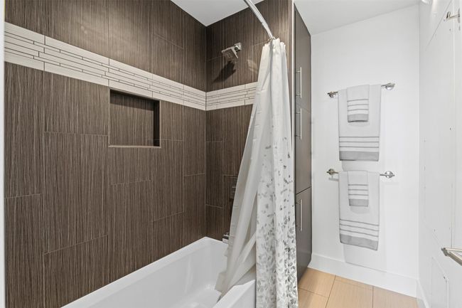 Full bath featuring shower / tub combo with curtain | Image 16