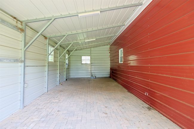 Garage with wood walls | Image 33