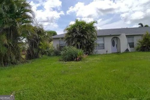 112 Swan Pkwy E, Royal Palm Beach, FL, 33411-2924 | Card Image