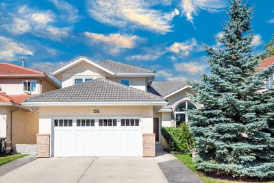 67 Hamptons Heath Nw, House detached with 4 bedrooms, 2 bathrooms and 4 parking in Calgary AB | Image 1