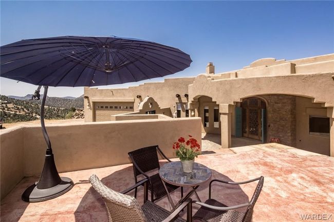 View of patio / terrace with outdoor dining area and a mountain view | Image 15