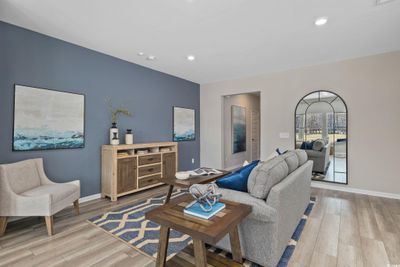 Living room featuring light hardwood / wood-style flooring | Image 2